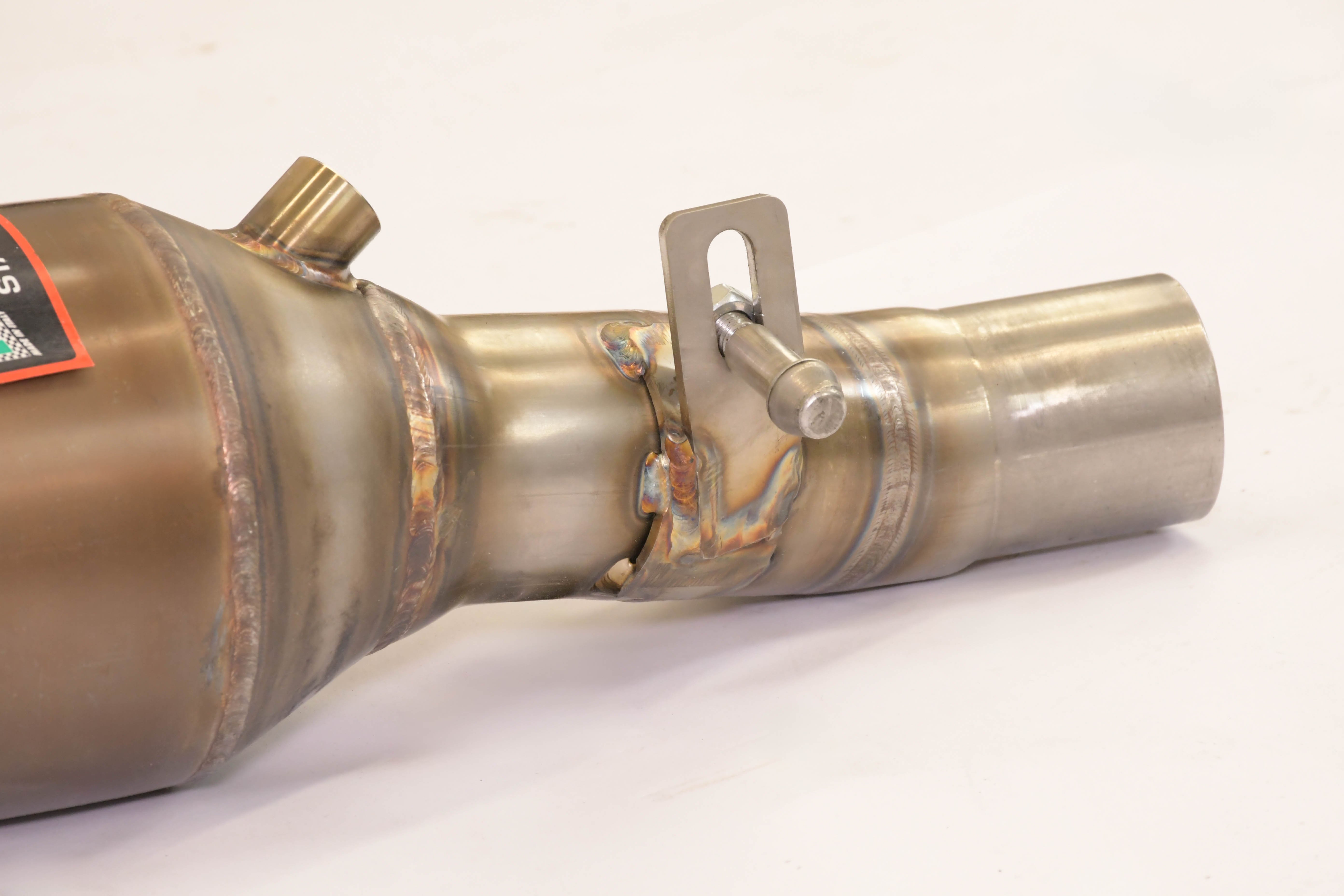 Front exhaust Left with Metallic catalytic converter.