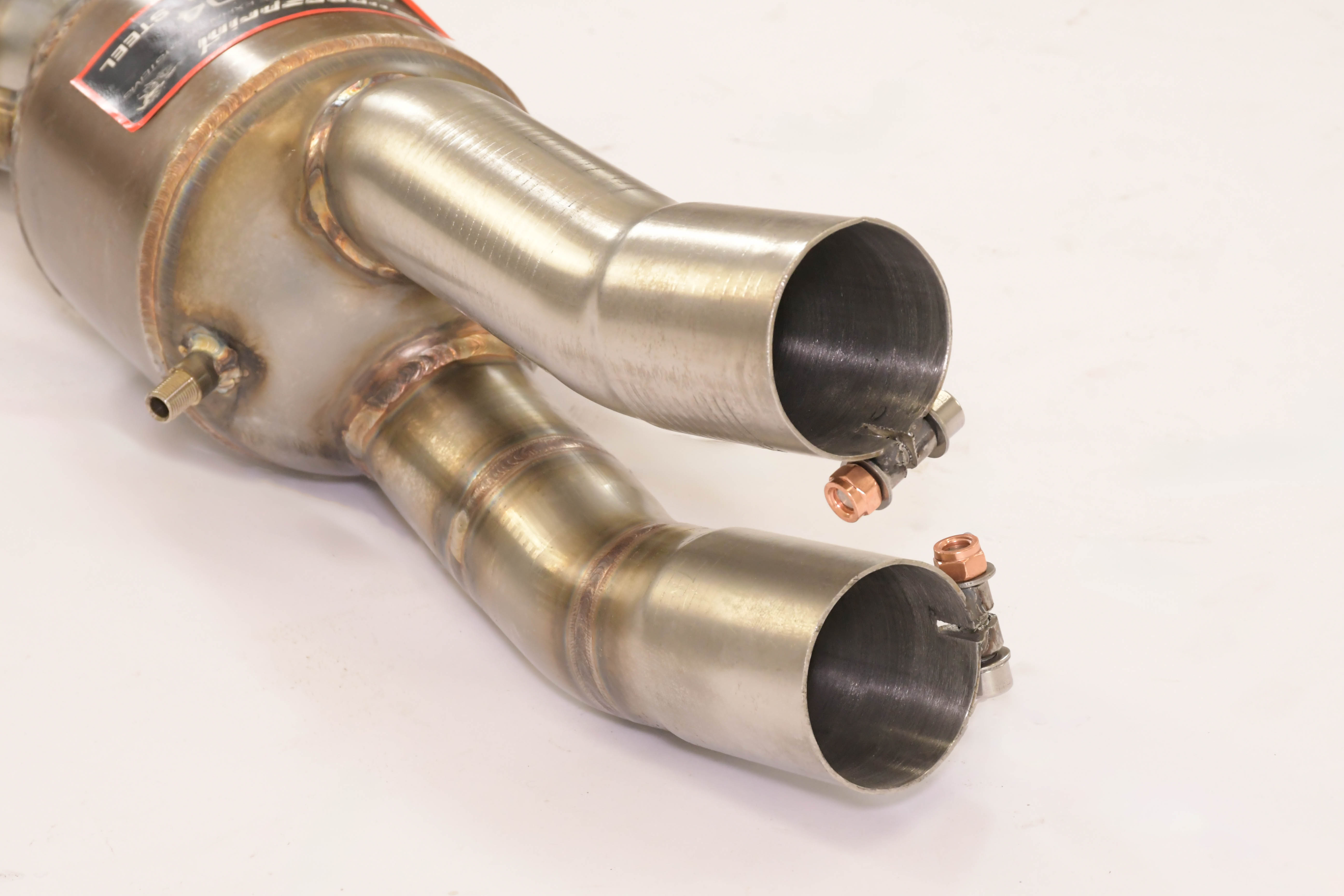 Front exhaust Left with Metallic catalytic converter.